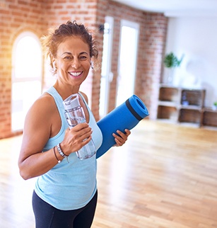 Woman smiling in workout class