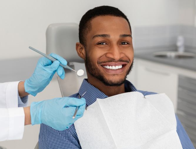 Patient in Austin smiling with dental implants