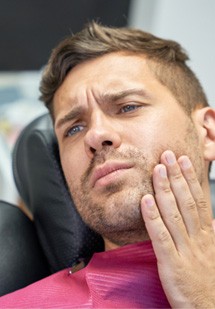 Woman experiencing tooth pain